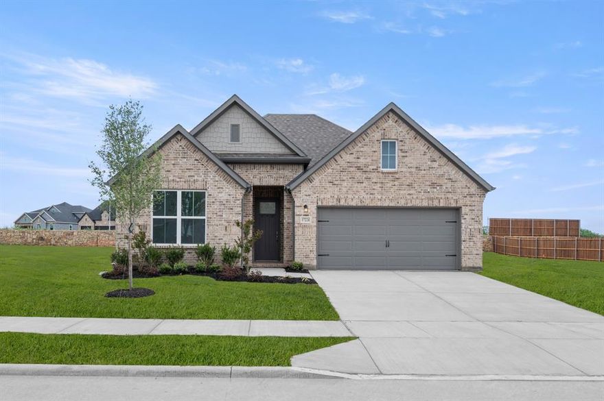 MLS# 21173992 - Built by RockWell Homes - Ready Now! ~ 4.99% Fixed Rate Promo (5.546%APR)* New single-story Patriot home plan by RockWell Homes , where thoughtful design meets modern convenience . This spacious home offers 4 bedrooms and 2.5 bathrooms , home office space, covered back yard patio, plus a 2-car garage , making it the perfect fit for growing families or those who need extra space. The exterior showcases a classic full brick façade , a welcoming covered porch , and energy-efficient dual-pane windows , 8-foot front door, providing both curb appeal and cost-effective comfort. Step inside to find an open-concept layout that seamlessly connects the kitchen , living , and dining areas , all situated at the back of the home with dual pane energy efficient windows for light and bright living. The living area is bathed in natural light from multiple dual-pane windows , and features vaulted ceilings over-looking the private back yard and patio area. The kitchen is a standout feature, complete with an island that includes a bar-top seating area . It's designed for both function and style with luxury solid surface countertops , an undermount sink , GE stainless steel appliances and a walk-in pantry . Additional kitchen amenities include a microwave , dishwasher , gas cooktop, oven, Delta faucets , 42-inch cabinets , a ceramic tile backsplash , upgraded flooring , over-sized storage pantry and recessed can lighting , making it a chef's dream. The primary bedroom suite , located at the back of the home for ultimate privacy...