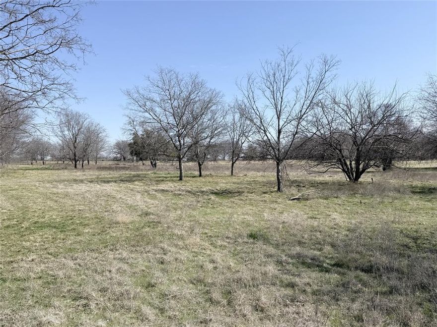This 3.10-acre lot within the city limits of Whitney features a balance of large mature trees and open build space. Located in the gated Lakewood Acres subdivision with City water, underground electric, and a chip sealed private road. Deed restrictions align with City of Whitney rules. Enjoy space, privacy, and wildlife in a centrally located community.