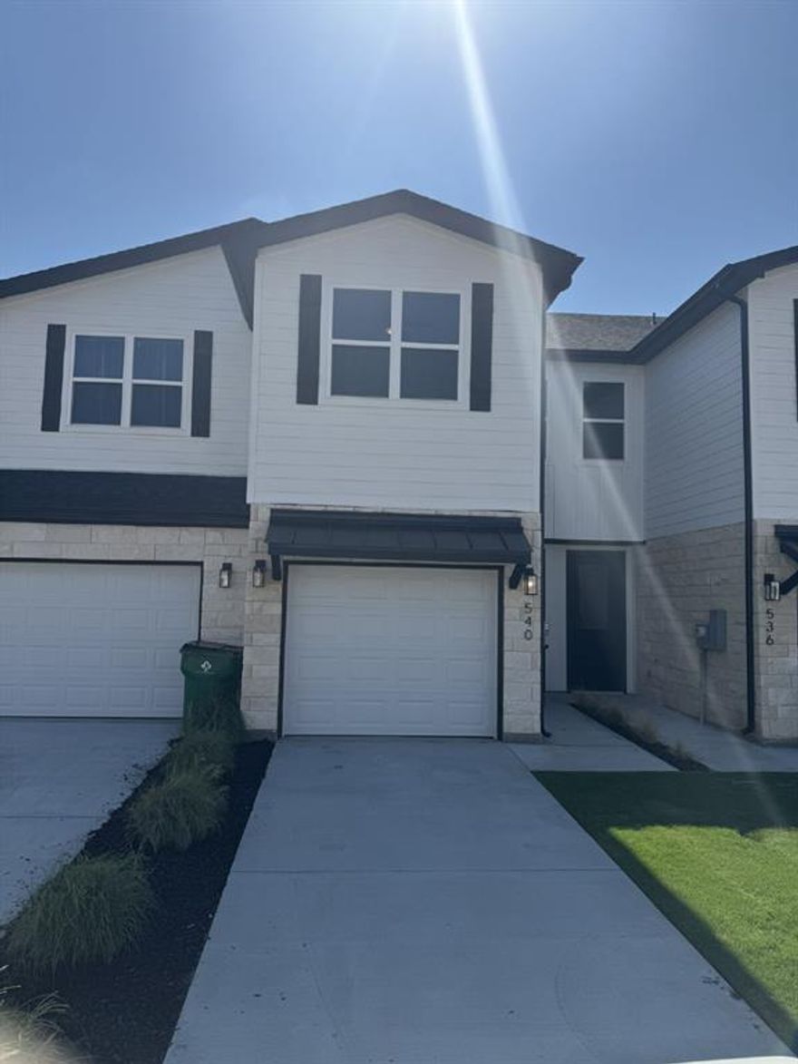 No need to pay for TSU parking with this one! This gorgeous 3 bedroom 3 bath townhome sits across from the Bosque River Taphouse and just across from the TSU baseball fields. Such an easy walk to campus. You won't be disappointed with the spaciousness of each level of this home. The open concept living room and kitchen boasts a bright, welcoming feel. Top notch appliances are included and the granite counter tops pop on the kitchen peninsula. The downstairs has a half bath and is perfect for hosting and hanging out with friends. But the upstairs can be your own private space! All of the large bedrooms are on the second level. The upper floor also has a second living area which can be used as your own comfy oasis, office space or zen aerobic workout area. There is plenty of storage space a 2 car garage to keep your vehicle out of the weather. All appliances are included in this efficient, new construction townhome. Lawn care is included and the green space landscaping is adorable and just enough for your pet to soak up the sun.