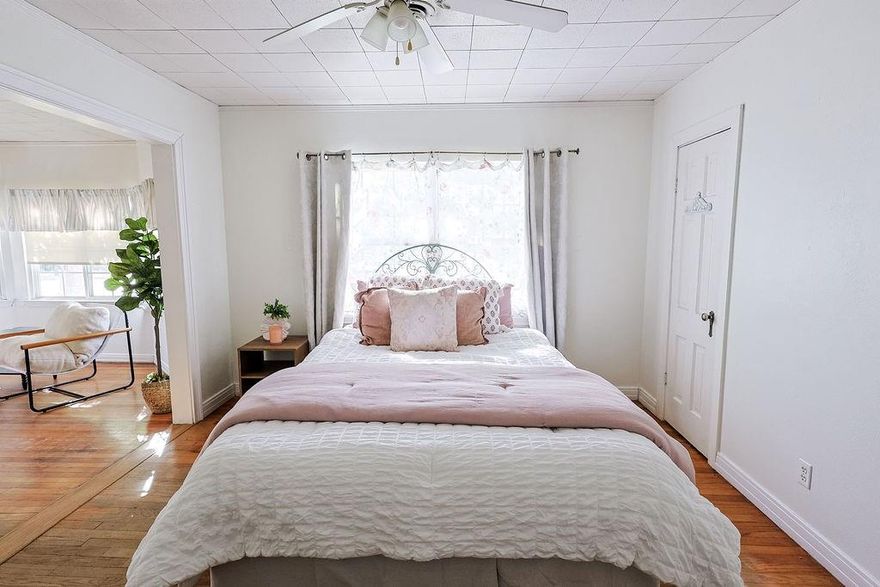 MOTIVATED SELLERS! This freshly painted West Oak Historic District of Denton is ready for new owners! This lovingly maintained home blends timeless charm with modern comfort, offering a warm and inviting atmosphere from the moment you step inside.

Original hardwood floors run throughout the main living areas, complemented by a cozy wood-burning fireplace in the formal living space—perfect for relaxing evenings or hosting guests. The layout is thoughtfully designed, providing a seamless flow between the living, dining, and kitchen spaces.The second living space is right off the kitchen and provides plenty of room to gather with friends and loved ones or just relax after a long day. Retreat to your private sanctuary in this expansive primary bedroom with en suite bath, thoughtfully designed for both comfort and style. A generous sitting area in the primary bedroom offers the perfect space to unwind with a book, enjoy morning coffee, or create a cozy lounge or workspace.

Step outside into your private backyard retreat, where you’ll find an expansive deck ideal for outdoor entertaining, a built-in firepit for cozy nights under the stars, and a pergola that adds charm for summer gatherings. Mature trees and thoughtful landscaping create a tranquil outdoor escape right in the heart of the city.

Located in a cul de sac just minutes from downtown Denton Square, UNT, Rayzor Ranch, I35 and US 380, shops, restaurants and medical offices, this home offers the perfect blend of historic character and urban convenience. Don’t miss the opportunity to own a piece of Denton history with all the comforts of modern living. This one is a must see! HVAC only 5 years old.