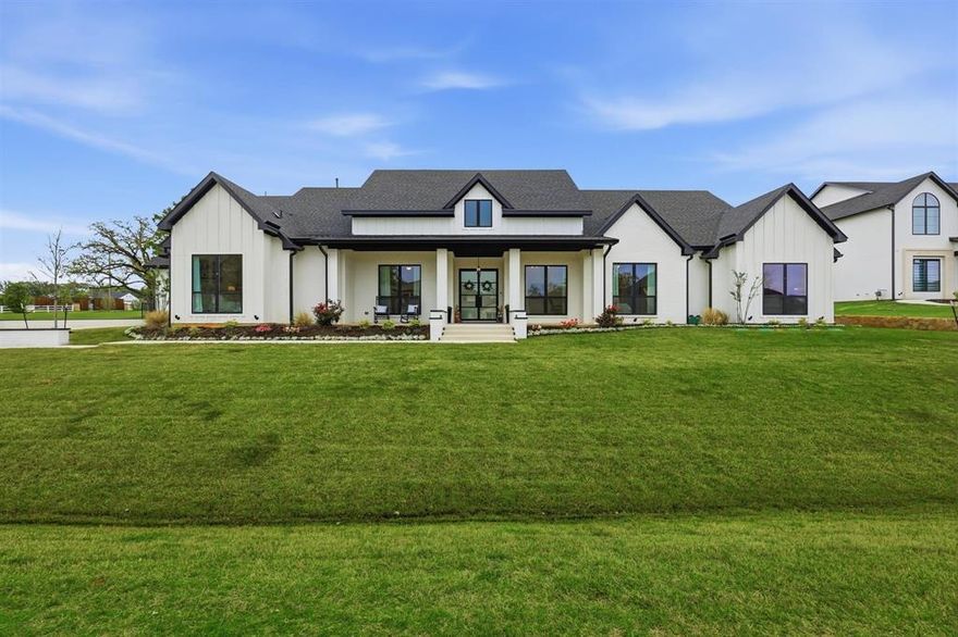 2025 custom modern farmhouse by award-winning Rembert Custom Homes, set on nearly one acre in Flower Mound. This 5-bedroom, 5.5-bath home features rift-cut white oak cabinetry, leathered Taj Mahal quartzite, and real white oak hardwood floors throughout with no carpet.
Designed for modern living, the layout includes three dedicated office spaces, a game room, and a private multi-generational suite with its own kitchen and laundry. Open-concept living with high ceilings and abundant natural light creates a seamless flow for everyday living and entertaining.
Situated on a 0.9-acre lot with room to add a pool, cabana, shop, or sports court. 3-car garage and low Flower Mound taxes.
A rare blend of luxury, flexibility, and new construction in a highly sought-after location. Buyer and Buyers agents to verify all information.