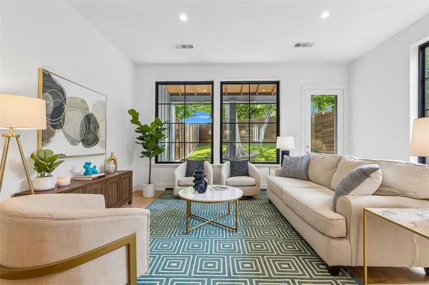 Modern design, exceptional natural light, and unbeatable walkability define this 2023-built single-family attached home in North Oak Cliff, just five blocks from the Bishop Arts District, moments from Kidd Springs Park, and a couple blocks from Methodist Dallas Medical Center. Enjoy a true neighborhood feel with quick access to Downtown Dallas, Uptown, and major employment centers.
Offering 3 bedrooms, a dedicated office, and 2.5 baths, this two-level home lives like a single-family residence while providing the efficiency of newer construction. The open-concept layout is filled with natural light, highlighted by expansive windows, tall ceilings, and wide-plank wood floors throughout—creating seamless sightlines from the kitchen to the living area and private backyard.
The chef’s kitchen features a large quartz island, gas range, two-tone cabinetry, stainless appliances, and designer lighting, opening effortlessly to the dining and living spaces—ideal for entertaining. Walls of windows overlook the fenced yard, while the covered patio extends the living space outdoors with low-maintenance artificial turf and mature trees.
Upstairs, a light-filled landing offers the perfect work-from-home office or flex space. The spacious primary suite includes a spa-inspired bath with dual vanities, walk-in shower, and generous closet space. Two additional bedrooms provide flexibility for guests, home office, or fitness.
Additional highlights include a 2-car garage, energy-efficient construction, modern finishes, and a quiet tree-lined street in one of Dallas’s most sought-after walkable neighborhoods near Bishop Arts, Kessler Park, and Trinity Groves.