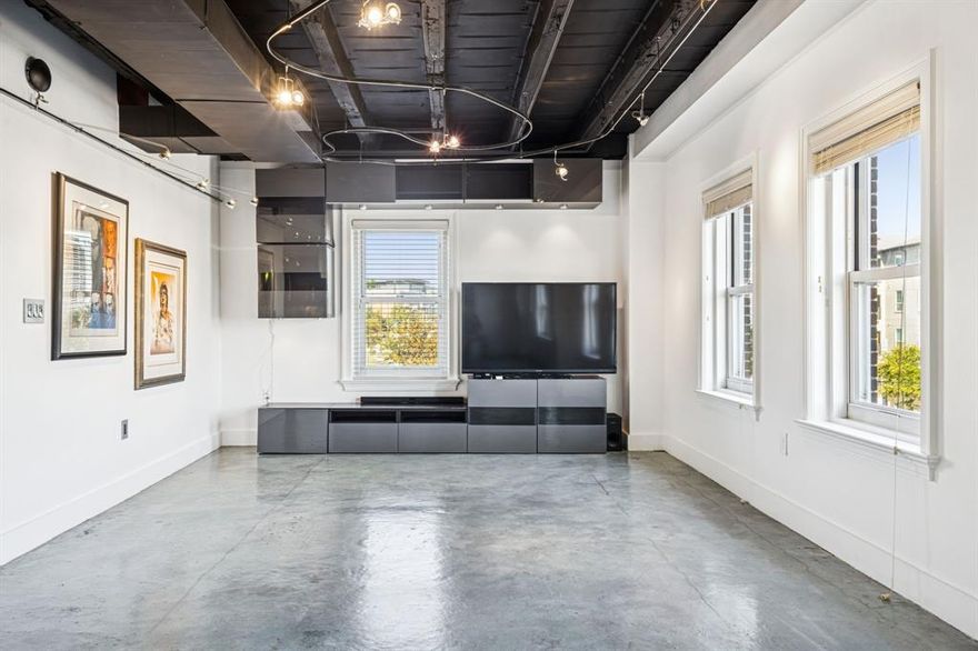 Welcome to historic Lake Cliff Towers, built 1929 era this stunning condominium community beautifully marries old-world charm with modern conveniences.This architectural gem is nestled between serene Founders Park and picturesque Lake Cliff Park, offering a tranquil oasis just minutes from the vibrant energy of Downtown Dallas and the electric Bishop Arts District. The buildings amenities include swiming pool, fir pit, fitness center, movie theater, wine lockers, and dog park,

This one bedroom, one bathroom loft style condo is located on the 3rd. floor offering sweeping views of downtown Dallas, and the tower's swimming pool. The unit features stained concrete floors, high beamed ceilings, and custom lighting with 925 sq ft of living space. The kitchen features custom cabinetry, lighting with a large glass top bar for entertaining, double-ovens, glass cook top, and microwave oven. The primary bedroom's ensuite bath features a walk in closet, shower, sunken tub, and washer and dryer.