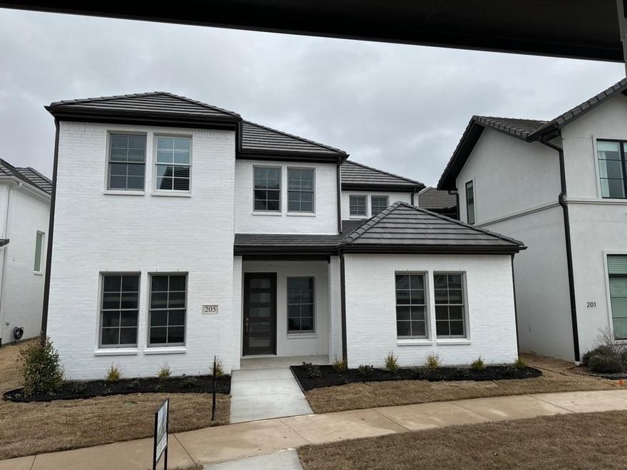 Entering from the covered front porch into the bright and welcoming foyer. To the left is a home office with a powder room near by. To the right is a private entrance into the owner's suite. The owner's bath comes with a dual sink vanity, garden tub and separate shower and a massive walk-in closet. Past the foyer, you enter into the open kitchen and family spaces. The kitchen offers an island with plenty of seating available, gas stove top and a walk-in pantry. A spacious dining area separates the kitchen from the family room. The living space offers a lot of natural light with views of the covered patio. Off the living room is the family entrance from the rear facing garage, as well as the laundry room that comes equipped with built in cabinets and a sink. Upstairs leads you to the open loft area, perfect for a secondary living room area, with 3 bedroom and 2 full bathrooms.