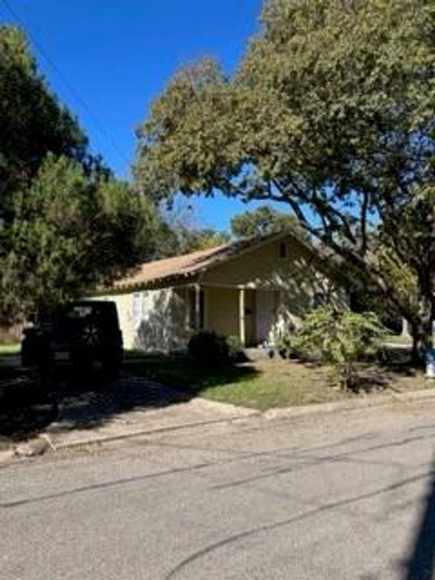 Great corner lot with lots of trees. A Frame home with 3 bedrooms and one bath. Washer dryer and refrigerator included. Remodeled and ready to move in to. 3 good size bedrooms with closets. Laminate flooring.