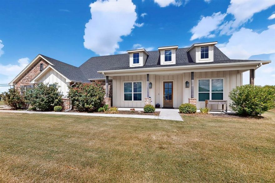 This exceptional one acre property offers a charming farmhouse lifestyle with modern conveniences. The spacious workshop equipped with power, perfect for hobbies, projects, or storage. The additional carport provides convenient covered parking, ideal for multiple vehicles or recreational equipment.  Enjoy outdoor living with a private pool, creating a perfect retreat for relaxation and entertaining. The property also features two outside tiny homes while the main residence embodies true farmhouse style, highlighted by a cozy wood-burning fireplace that adds warmth and character.