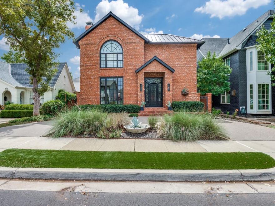 This beautifully updated home blends charm and sophistication with a bright, open feel throughout. The main level offers a guest bedroom and a private office, a gourmet kitchen with ample storage, and inviting living areas highlighted by tall ceilings, rich hardwood floors, and elegant European-inspired lighting. A dramatic staircase with a striking stained-glass window sets the tone for the home’s character. Upstairs, you’ll find the second bedroom along with the expansive primary suite, complete with custom built-ins, a spa-inspired marble bath, a sunroom retreat, and an impressive walk-in closet. Other highlights include a cedar closet, recent updates to the roof, windows, HVAC, and French doors (2018–2022), and a heated & cooled oversized two-car garage currently used as storage with one bay for parking, plus a circular drive with space for three cars. Light, bright, and thoughtfully designed, this home offers a warm and welcoming atmosphere in a prime location—walking distance to McCullough Middle School and within the acclaimed Highland Park ISD.