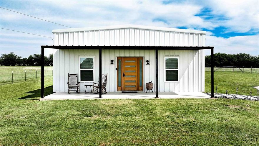 Looking for a newer barndominium, on AG exempt acreage, in Hunt County, Texas, with quick Interstate 30 access? This 2024-built 2 bedroom, barndo, sits on 9 picture perfect, unincorporated acres, just outside Campbell and less than 1 mile from Interstate 30, making commuting to Greenville, Sulphur Springs, and the DFW growth corridor convenient.

This Texas proud 1,200 square foot barndo, looks like Chip and Joanne bult it and features an open-concept design with a vaulted shiplap ceiling, modern kitchen with a large quartz topped island, and a spacious dining area. Bedrooms are ample and the layout is functional and ideal for full-time living or a weekend retreat. Your pets will appreciate the fence around the home. 

Step outside and experience wide open TX land with room for horses, livestock, and a workshop. The acreage is mostly pasture, with great soil and offers flexibility for homesteading, recreation, or long-term investment. This unincorporated land is AG exempt, with NO HOA and NO city taxes. Bring your horses, they will love it here. You don't have a horse? Maybe you need one.   

Location matters and you are minutes to Greenville for shopping and services, a short drive to Sulphur Springs for dining, bougie boutiques, and about 42 miles to the future McKinney National Airport. The area is seeing continued growth, adding to the long-term upside of owning land in this corridor.

Need more land? Two additional adjacent 9-acre tracts are available (MLS 21244462 & 2124468), allowing for expansion, a family compound or multi-generational living. Gentle deed restrictions help protect your investment. Boundary lines approximate. Information deemed accurate, but Buyer perform diligence. See the videos. 
barndominium with land in Texas, homes with acreage near Greenville TX, Hunt County country home, land with house near Interstate 30, TX homestead property, horse property near DFW, rural property with modern home, barndo for sale NE Texas, TX barndo