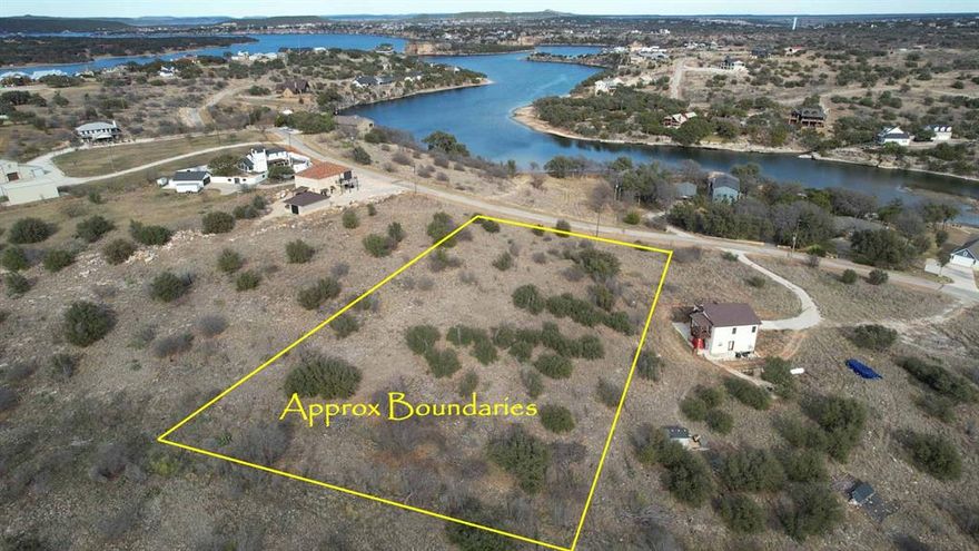 Almost two acres (1.996 ac) in Sportsmans World at Possum Kingdom Lake, the home of Hells Gate, and this lot sits right across the street from Hells Gate Cove. Plenty of elbow room and minimal restrictions make this an ideal location for building that lake home you've been dreaming of when you're ready - no time requirement for when you must build. Numerous established homes and newly constructed homes in the vicinity of this lot, but neighboring lots are large enough that none feel too close.  Amenities available to Sportsmans World property owners include an airstrip, Bluff Creek Marina and boat ramp, community pavilion with pool, tennis courts, playground and disc golf, plus the benefits of a volunteer fire department within the subdivision. Come see this lake view lot and consider joining this great community so you can start living and loving the PK Lake Life!