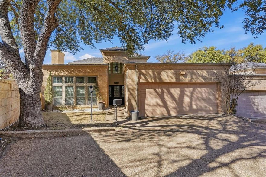 Amazing opportunity to enjoy a low maintenance, lock & leave lifestyle with this totally updated townhome on Overton Terrace Court. This rarely available 3 bed, 2.5 bath end-unit is conveniently located proximate to TCU, Overton Park schooling, shopping and dining and Trinity trails. The main floor has beautiful hardwoods, two living areas and fireplaces, a powder room and dining. The kitchen features upgraded stainless steel appliances, granite countertops and a large center island. Additionally, on the main floor is the bright and sunny master suite with direct access to the rear patio, courtyard. It connects to a spacious private bath with separate shower, soaking tub and thoughtfully designed walk-in closet. The second floor is accessed via a curved staircase, with two additional bedrooms and a beautifully redone full bath. The home also features a convenient laundry room, pantry, two car garage and smart home security system. Within walking distance from community pool and direct Trinity trail access.