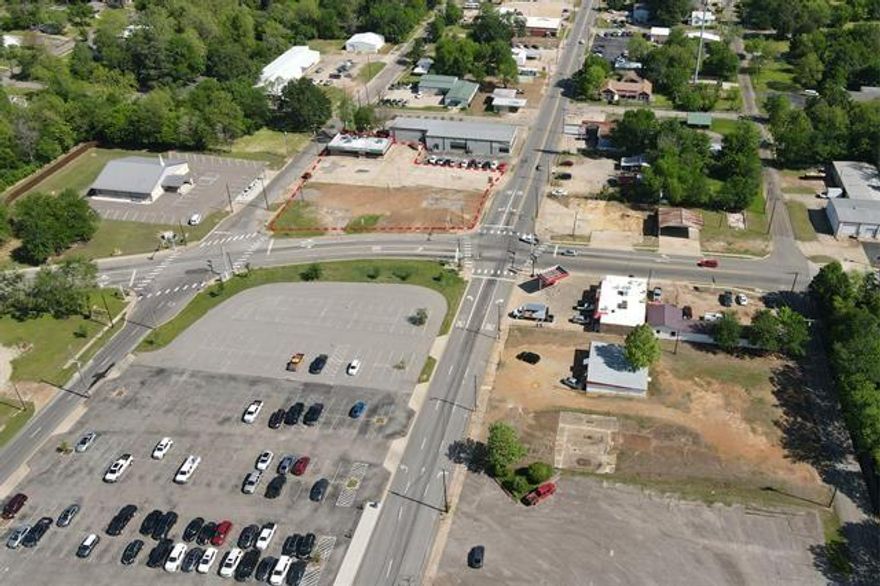 Survey on file. Former Restaurant on over 1 acre with exceptional high traffic count. Parking never an issue because property has access points from North Main (Highway 217 North Business), Graham Street, and 1st Street North West. Get started today with your new business in beautiful Downtown Paris, Texas.