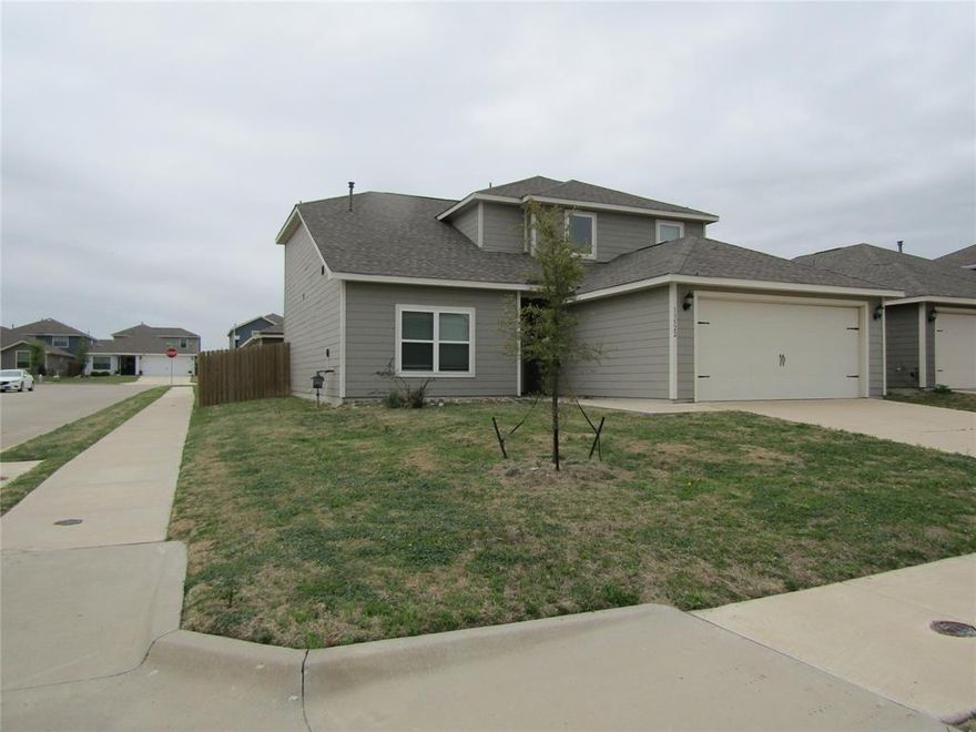 This property features a highly desirable floor plan with ample space for everyone. The primary bedroom is located downstairs, while three additional bedrooms are upstairs, offering a split layout that ensures both convenience and privacy. The kitchen is a chef's paradise, equipped with energy-efficient appliances, oversized cabinets, and stunning granite countertops. Its open-concept connection to the dining and living areas creates a light, bright, and welcoming atmosphere. Additionally, the master bath includes a separate shower, a large garden tub, and a dual-sink vanity. PROFESSIONAL PICTURES WILL BE UPLOADED THIS WEEK!