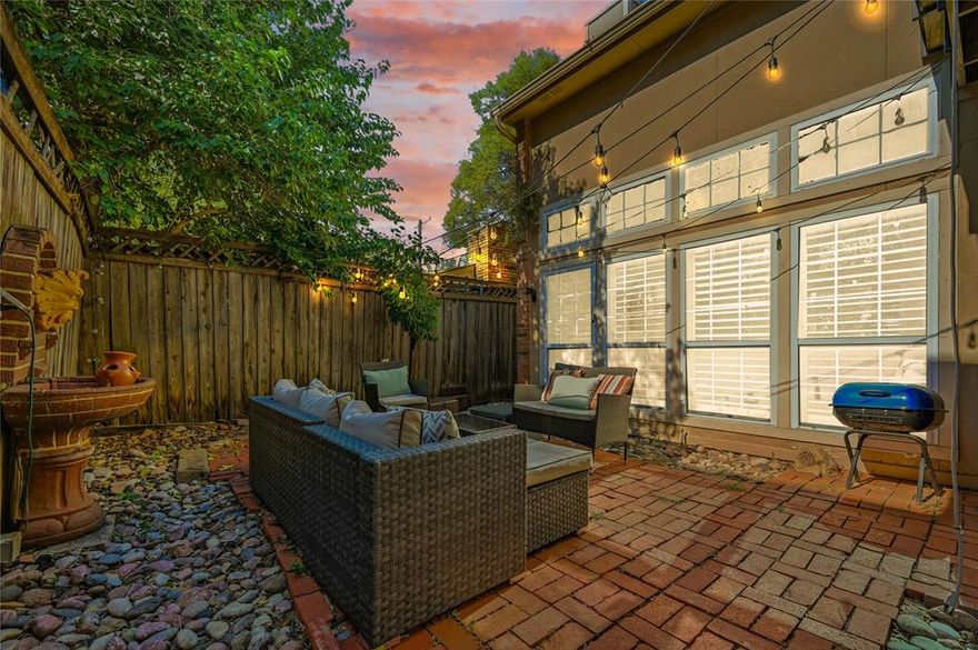 FULLY FURNISHED 2-STORY HALF DUPLEX IN THE HEART OF OAK LAWN! You’ll enjoy a perfect setting for relaxing and entertaining in this stunning home graced with plantation shutters, soaring ceilings, updated bathrooms, tons of double and triple pane windows for natural light, stamped concrete flooring, crown molding, and a cozy fireplace, plus a recently replaced dishwasher and water heater. Prepare meals in the gourmet kitchen featuring granite countertops, stainless steel appliances, a pantry, and a breakfast bar, or pamper yourself in the luxurious primary suite showcasing a balcony, tray ceiling, oversized frameless walk-in shower, dual sink granite vanity, skylight, and a walk-in closet with built-ins. Step outside to the private patio, perfect for lounging, dining, or quiet relaxation. Situated in a coveted Oak Lawn setting within walking distance to the area’s vibrant city life, including popular restaurants, boutique shopping, and energetic nightlife. This property offers outstanding income potential as an Airbnb rental, generating $74K in revenue last year with an impressive 80% occupancy rate. Furniture can be included with the sale or removed upon request, offering flexibility to suit the buyer’s preference. Fridge, washer and dryer convey. Take a first-person look at this gorgeous home! Click the Virtual Tour link to see the 3D Tour!