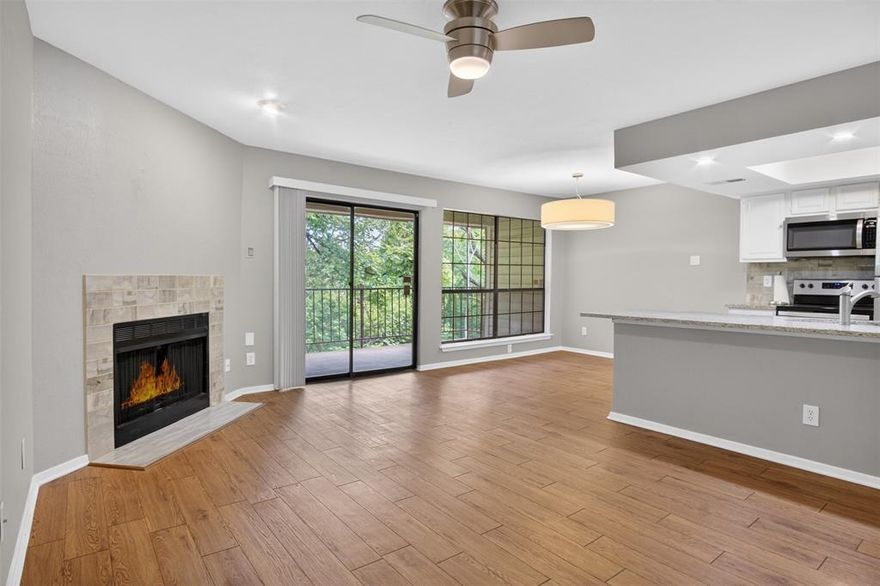 Perfect for nature lovers, this charming second-floor condo is nestled within a lush, park-like community backing directly up to Stevens Park Golf Course and the scenic Coombs Creek Trail. Enjoy miles of tree-lined paths through Kessler Park right outside your door, while still being just minutes from downtown and Bishop Arts, offering the best of both tranquility and convenience.
Inside, the 2-bedroom, 2-bath layout feels open and inviting, with warm flooring and abundant natural light creating a cozy vibe. Step out onto your oversized covered patio and you’ll feel like you’re in your own private treehouse! 
The community itself features beautifully maintained grounds and a gorgeous double pool, perfect for relaxing or entertaining. Even better, the HOA covers: water, trash, blanket insurance, and exterior maintenance, giving you a true low-maintenance lifestyle.