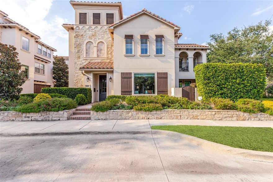 Don’t miss this extremely rare opportunity to own an exceptional residence in the highly sought-after Courtyards of Normandy, ideally situated on a prime corner lot within walking distance to Highland Park Village and Bradfield Elementary. Step into a beautifully appointed foyer that opens to an expansive main living area featuring soaring windows that flood the space with natural light, a cozy fireplace, and an elegant dry bar adorned with custom builtins, Schumacher wallpaper, and custom glass shelving, a perfect blend of style and function. The chef inspired eat in kitchen, fully renovated in 2021, overlooks the dining area and opens to a charming stone patio framed by lush landscaping and a tranquil fountain, an ideal setting for entertaining or relaxing outdoors. Upstairs, a spacious second living area offers custom builtins and a flexible layout perfect for a home office or bonus space. The primary suite is a true retreat, featuring a private balcony, a spa like ensuite bath, and an oversized walk in closet designed for luxury and comfort. The third floor hosts two generous guest bedrooms, each with its own private ensuite bath, providing ample space and privacy for family or visitors. Additional highlights include an elevator servicing all three floors, and recent upgrades such as a new roof, renovated kitchen, first floor window replacements, updated landscaping, fresh interior paint, designer light fixtures, and motorized window shades. This exceptional home in the heart of the Park Cities combines timeless elegance with modern luxury, an unparalleled offering that truly has it all.