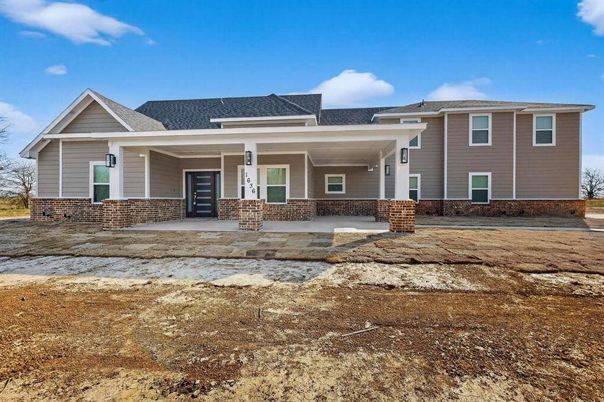 Beautiful new construction modern home situated on 13.11 acres, offering space, privacy, and peaceful country living. This thoughtfully designed property features 7 bedrooms with a versatile layout — 4 bedrooms downstairs, including the spacious primary suite, and 3 bedrooms upstairs along with a game area. The home offers 3 full bathrooms and 1 half bath. The kitchen comes fully equipped with a refrigerator, microwave, dishwasher, and electric range. The builder has also installed gas piping to the range for future conversion if desired. Quartz countertops and custom cabinetry are featured throughout the home. Additional highlights include hardwood floors, foam insulation for improved energy efficiency, and a cozy wood burning fireplace. Outside, enjoy the covered front patio, beautiful acreage with a small pond, and a 2 car garage with an automatic opener. Seller is offering $5,000 in closing cost assistance to the buyer with an acceptable offer. The perfect blend of modern comfort and country charm!