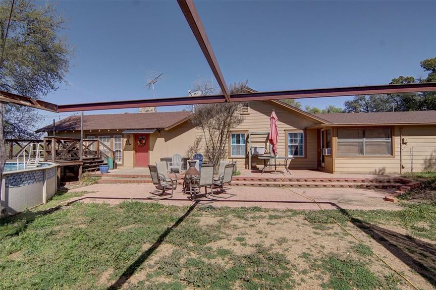 If you're searching for a farmhouse, consider this property. Incudes a One bedroom guest house perfect for a in-law suite or teenager quarters. With kitchen, full bath, large walk-in closet with washer and dryer hook ups.  Main house has 2218 square feet and guest house has about 600 square feet. This home has spacious rooms ideal for entertaining guest, with wood, ceramic and carpet flooring. Out the front you have a large yard with an above ground pool and a large patio great for family gatherings.  Close to highway access 7 minutes to Lake Worth and about 20 minutes to Downtown Fort Worth and  Nearby schools and shopping centers.