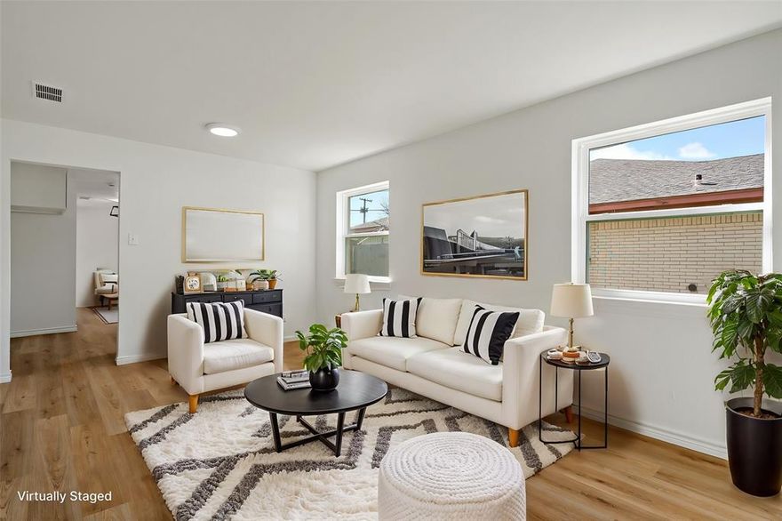 Turn-key, completely REMODELED 2 bed, 2 bath half-duplex near 635 and 10 minutes to White Rock Lake. White oak-look luxury vinyl flooring, contemporary bathroom updates, MODERN lighting and Neutral kitchen with never been used stainless steel appliances, sleek countertops and shaker style cabinetry - What's not to LOVE?! Imagine waking up in your beautifully REMODELED home, sipping coffee in your bright, eat-in kitchen, while you get ready for your easy commute to work. Welcome to 12816 Pandora Drive! This single-story half duplex offers modern updates with convenient access to every corner of Dallas. ALL NEW WINDOWS provide energy efficiency and add to the low-maintenance lifestyle. The oversized single stall rear garage has built in shelves for ample storage and an uncovered breezeway to the back patio, surrounded by 6' wood fence, adding security and privacy to your personal backyard. Located in a high-demand area, you're minutes from major employers like AT&T and American Airlines, Dallas College, and top entertainment spots, including NorthPark Center, TopGolf, and White Rock Lake. With easy access to 635 & 75, commuting to any corner of the metroplex is effortless, making this an ideal location.