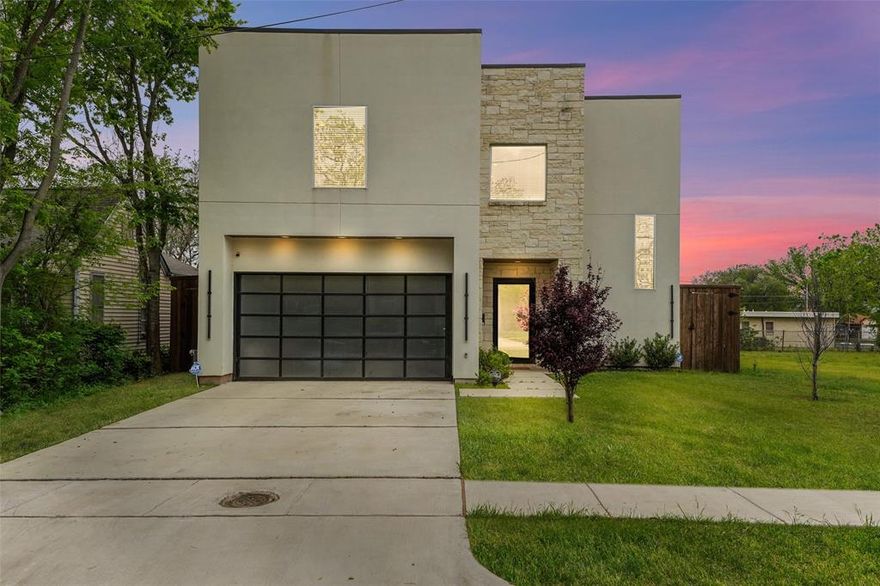 MODERN CUSTOM HOME COMPLETED IN 2023. TAX RECORDS MAY REFLECT AN EARLIER FOUNDATION DATE! Stunning contemporary showstopper offering 4 bedrooms, 3.5 baths, and a 2-car garage with upscale finishes throughout. This thoughtfully designed home features foam insulation, rich wood flooring, custom cabinetry, LED lighting, and a full smart home system with integrated plugs and switches. The open-concept layout is anchored by a chef’s kitchen complete with quartz countertops, a large island with breakfast bar, premium appliances including a 36” range, and a spacious walk-in pantry. Ideal for entertaining, the home boasts a formal dining area with a wine cellar and an expansive living room highlighted by a ventless fireplace. The private primary suite offers a spa-inspired bath with a separate shower, oversized jetted tub, dual vanities, and a generous walk-in closet. Additional features include a custom laundry room with built-ins, a versatile game room with balcony access, and a beautifully covered patio overlooking a cocktail pool, perfect for indoor-outdoor living.