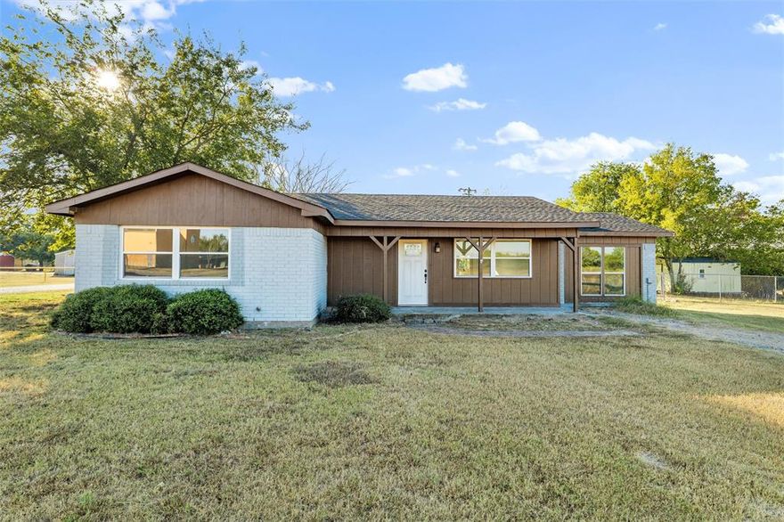 **Seller is offering 3k towards buyers choice of appliances OR concessions!** A charming opportunity in the heart of Italy, TX, this 2-bedroom, 1-bath home sits on a generous 0.344-acre corner lot with 1,468 sq. ft. of living space. Recently refreshed with modern updates, the home blends clean finishes and natural light with plenty of room to grow. The kitchen offers ample cabinetry and granite-style countertops, creating a bright and functional workspace. Two spacious bedrooms feature updated flooring and fresh paint, while the bathroom showcases stylish tile and a new vanity. An open layout flows easily into the living and dining areas, perfect for entertaining or everyday living. Outdoors, the expansive yard provides endless potential—ideal for gardening, gatherings, or simply enjoying the wide Texas skies.

With its prime location and move-in-ready updates, this property offers the perfect balance of comfort, space, and opportunity.