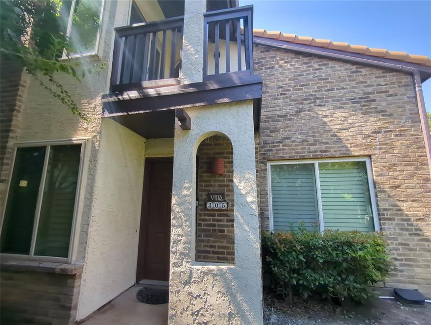 Beautiful and updated two story condo in gated community.  Located in Far North Dallas near the Galleria mall and Addison.  Nice and open living area with fireplace off of dining and eat-in kitchen.  Primary bed downstairs and second bed upstairs with separate office area and loft.  Luxury vinyl plank flooring throughout except kitchen and bathrooms.  Kitchen features stone counter tops and stainless appliances.  Full size washer and dryer connections off kitchen.  Fenced patio off dining and covered patio off second bed upstairs.  One covered parking space included, #064.  HOA includes water, trash, and community pool.