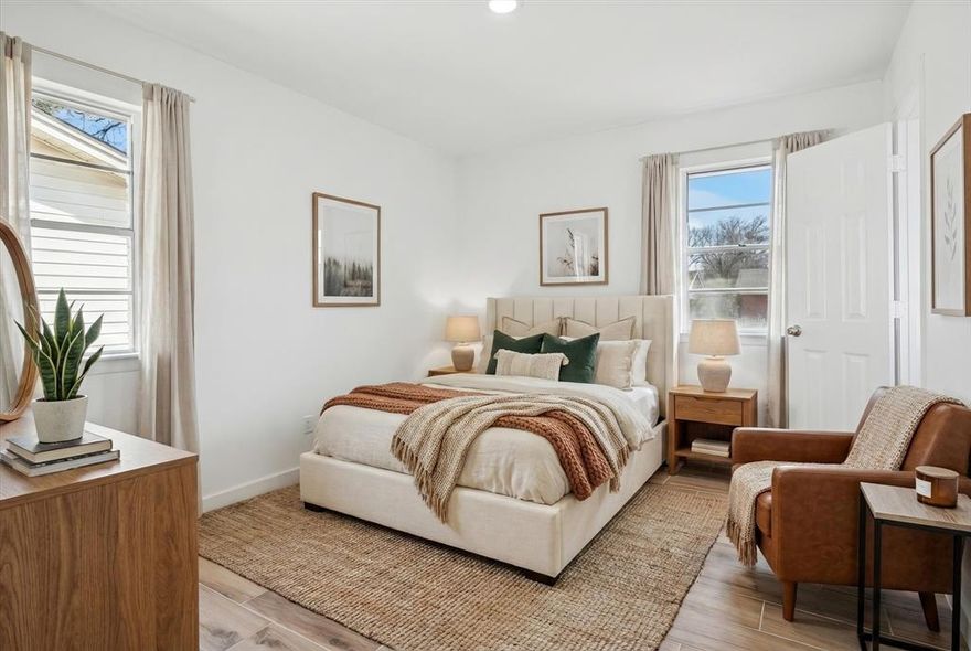 This charming, newly updated home in the heart of Irving offers a blend of contemporary style with functional living. With a total of four spacious bedrooms and 2 full bathrooms, this home provides flexibility for any lifestyle. The fourth bedroom (bonus room) is large enough to serve as a second living room or versatile game room, making it ideal for families, guests, or those needing extra space for work or play. The open-concept kitchen, living, and dining areas create a seamless flow. The modern kitchen boasts quartz countertops and stainless appliances, offering both durability and style. The beautifully updated bathrooms have designer touches and contemporary fixtures. The laundry room has ample space to provide function as well as storage. Other recent updates include wood-look tile flooring, fresh paint, elegant recessed lighting, new AC condenser and ductwork, and a new roof.  Every corner of this home reflects thoughtful updates, bringing peace of mind and modern appeal. Step outside to the large, welcoming backyard which offers a nice outdoor shed with built-in, wrap-around shelving and lighting, ideal for extra storage, hobbies or workshop needs. Minutes from major highways, shopping, entertainment and restaurants!