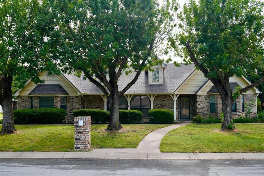 This beautiful 4-bed, 3.5-bath custom home sits on a spacious corner lot and offers room to spread out with a bright, open layout, fresh flooring, and modern paint throughout. Enjoy two living areas, built-ins, an oversized laundry room, and a private main suite—all complemented by a 3-car garage and a fenced yard with a sprinkler system. Landlord-provided AC filter service adds convenience, and the large backyard is perfect for relaxing or entertaining. This is a must-see lease in a prime Justin location!