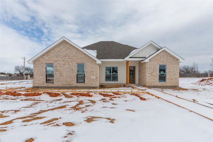 New construction home featuring 4 bedrooms and 2 bathrooms. Open living, dining, and kitchen layout. Primary bedroom includes ensuite bath with dual sinks, separate shower, and large walk-in closet. Three additional bedrooms. New systems and fixtures throughout. Fence included. Full front yard irrigation and landscaping with partial backyard irrigation and landscaping, with option to extend. Quiet small-town location.