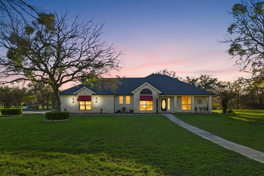 Welcome to 3801 Ridge Road — where everyday life feels like a getaway. Surrounded by mature trees and Texas wildlife, this home is more than walls and windows; it’s a retreat, a gathering place, and a story waiting to be written. From the moment you step inside, you’ll feel the warmth of light-filled spaces designed for connection. The open floor plan flows with ease, inviting laughter in the living room, conversation around the kitchen island, and memories made at every turn. The kitchen isn’t just functional — it’s the heartbeat of the home, ready for family dinners, holiday feasts, and late-night snacks after a swim. The primary suite is your private sanctuary, a place to recharge and dream. Additional bedrooms offer flexibility for family, guests, or the perfect home office. Every detail has been thoughtfully crafted to balance comfort with style. Step outside and discover your own backyard oasis. A sparkling pool glistens under the Texas sun, while deer wander across the property like clockwork, adding a touch of country magic to your mornings. Evenings are made for grilling, gathering, and watching the stars. And for those who need space to create, build, or store — the large shop with two bays and full electric service is a rare gem. Whether it’s cars, projects, or hobbies, this space expands the possibilities of how you live. Location seals the deal. Families will love being near Weatherford ISD schools like Martin Elementary and Tison Middle School. You’re minutes from shopping and dining along the I-20 corridor, close to Aledo and Weatherford, and just a short drive to Fort Worth for work or play. Lake Weatherford, local golf courses, and Clearfork’s upscale dining are all within reach, giving you the best of both quiet living and vibrant city life.3801 Ridge Rd isn’t just a house — it’s a lifestyle. A place where mornings start with deer in the yard, afternoons end by the pool, and every day feels like home.