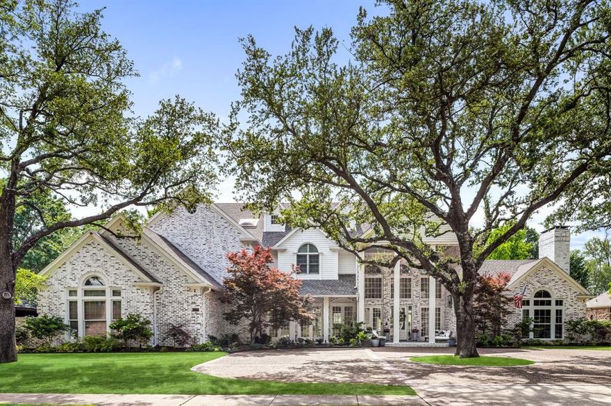 Impressive estate behind a well highly sought after community located on #1 hole at Queens Course Gleneagles offers abundant luxury and extensive updates. Remodel of almost entire house includes designer finishes, new hardwood floors, new iron balusters on staircase, designer lighting, wallpapers, and huge utility room with storage. Enter to a dramatic floating staircase with walls of windows looking to pool and golf course beyond. Chic dining room sparkles with modern chandelier and walls of windows that bring bright ambiance. Stunning formal living is perfect for gatherings and holidays that features beautiful arched windows overlooking the golf course, custom quartzite fireplace, and stylish built-ins. Airy and spacious sunken family room provides easy flow to gourmet kitchen and patio, and features see-through fireplace and generous built-ins. Convenient wet bar with built-in wine fridge makes entertaining a breeze. Updated gourmet kitchen boasts sleek Wolf range and commercial vent, and SS sink and appliances that include oversized built-in fridge and warming drawer. Gorgeous quartzite countertops and clean white cabinetry provide great serving and storage options. Sunny breakfast nook is surrounded by windows that offer peaceful views and a stylish chandelier adds soft lighting. Handsome oversized study is full of hardwood built-ins and vaulted ceilings that add style to this ideal working space. Hotel living awaits in the primary sanctuary with built-in coffee maker & fridge, quartzite fireplace, and private door to outdoor oasis. Incredible bath features his & hers separate sides and closets! It invites you to relax in garden tub overlooking lush golf course, and separate shower with 2 rainshower heads. Your oasis awaits.