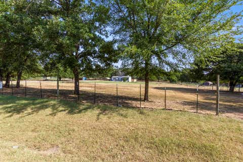 Photo of 313 Hogan Lane, Whitesboro, TX 76273 (MLS # 21348731)