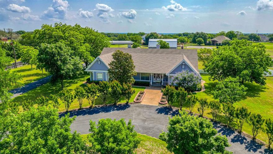 Welcome to Clear Lake Estates Addition, where nature meets architectural elegance. This magnificent house is situated on 1.92-acre lot adorned with beautiful trees. Prepare to be enchanted by the abundant wildlife that frequents the area. As you step inside, you'll immediately notice the original architectural details that have been lovingly preserved. The craftsmanship and attention to detail are evident in every corner, adding a touch of timeless charm to the residence. In addition to the main house, a detached shop adds incredible value to this property with a 1 bedroom loft apartment above, providing a separate living space. Location is everything, and you'll enjoy the tranquility of a rural setting while being just a short distance away from all that Weatherford has to offer. Don't miss the opportunity to make this stunning house your new home. With its impeccable architectural details, natural beauty, and convenient location, it's a true gem in Clear Lake Estates Addition.