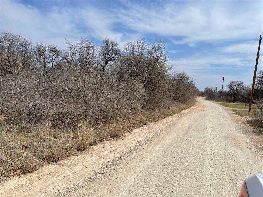 Approx 1.9 Acres +or - In Oakwood North, Just 3 Miles Outside of Hawley, Tx!  NO Deed Restrictions and Mobile or Manufactured Homes Welcomed!  Water and Electric Available, Lot has Trees, Brush and PRIVACY!