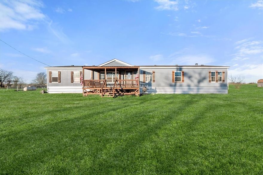 Spacious country living on 1 acre just minutes from Corsicana! This 4-bedroom, 2-bath home offers plenty of room to spread out with two separate living areas and two fireplaces, creating a warm and inviting atmosphere perfect for relaxing or entertaining. The open floor plan allows the living, dining, and kitchen areas to flow seamlessly together, making everyday living comfortable and functional.

The kitchen features beautiful granite countertops and ample space for cooking, gathering, and hosting family or friends. With two living rooms, there is flexibility for a second lounge area, media space, home office, or playroom.

Enjoy peaceful mornings on the front porch and unwind in the evenings on the back porch while taking in the quiet country surroundings. The home sits on a nicely paved county road, offering both convenience and the charm of country living.

Located just minutes from Corsicana and centrally positioned between Dallas and Waco, this property offers the perfect balance of rural space and accessibility. With a full acre of land, there is plenty of room for outdoor activities, gardening, or simply enjoying the open space.

If you're looking for space, comfort, and peaceful country living while still being close to town amenities, this property is one you’ll want to see.