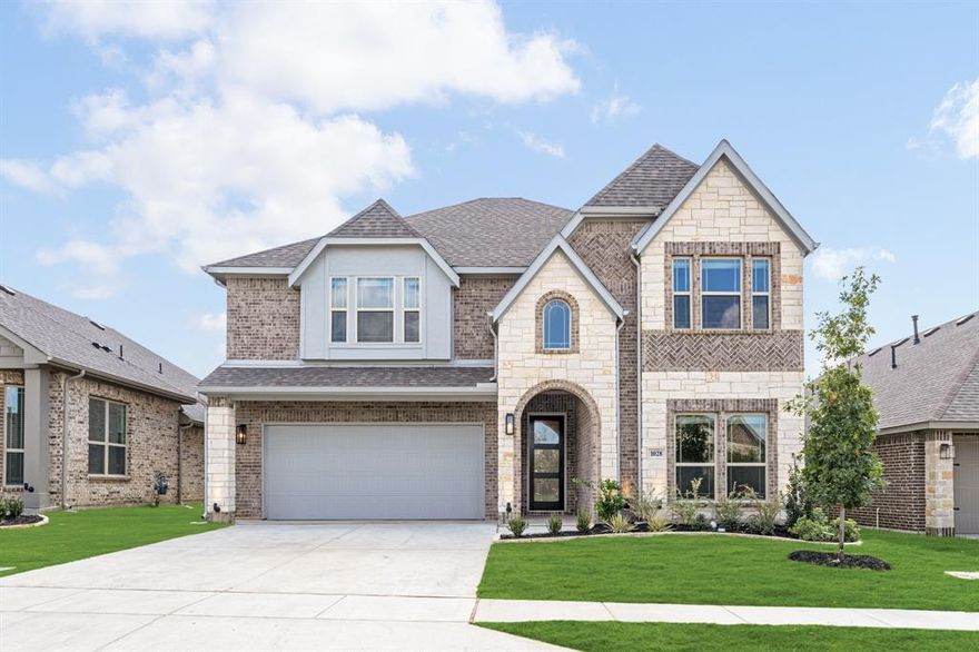 NEW! NEVER LIVED IN. Move-In Ready. Bloomfield’s Rose II plan delivers the perfect blend of space, style, and smart design with 5 bedrooms and 4 full baths set across a layout that feels both impressive and practical. From the moment you arrive, the striking brick-and-stone exterior with its 8’ front door featuring rain glass makes a statement of sophistication. Inside, upgraded tile flooring runs throughout the main areas, guiding you through soaring ceilings and sunlit spaces that balance openness with warmth. The heart of the home is the Deluxe Kitchen, where custom cabinetry pairs with Quartz countertops, a vent hood, built-in stainless steel appliances, and an oversized island that flows seamlessly into the Family Room. Anchored by a stacked stone-to-ceiling fireplace, this gathering space is both dramatic and inviting, with walls of windows framing backyard views. A thoughtful first-floor layout includes the Primary Suite, boasting dual vanities, a soaking tub, a separate shower, and a large walk-in closet, plus a second bedroom downstairs ideal for guests or multi-gen living. Upstairs, 3 more bedrooms, 2 full baths, and a Game Room give everyone their own retreat. Details like a mud bench in the utility room, upgraded lighting, surround sound prewired in Media Room, and included gutters and blinds enhance everyday ease, while the covered patio extends your living outdoors. With its oversized lot and elegant finishes throughout, the Rose II proves that luxury and livability can coexist beautifully. Call or visit Bloomfield today!