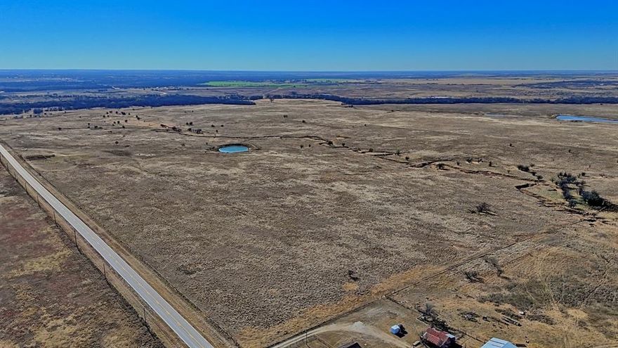 Located just four miles north of Henrietta, Texas, the Yellow House Ranch is a versatile North Texas ranching and recreational property encompassing approximately 401 acres in Clay County. Featuring expansive native grass prairies and an attractive hardwood-lined creek bottom along the southern portion of the property, this ranch offers an excellent balance of productive grazing land and high-quality wildlife habitat.

Turkey Creek flows near the southern boundary of the ranch, providing scenic views, natural drainage, and exceptional hunting opportunities for trophy whitetail deer, Rio Grande turkey, wild hogs, and varmints. The ranch has been primarily operated as a cattle property, with well-managed native grasses that have been maintained throughout the acreage.

Access is excellent, with extensive frontage along FM 1197, one livestock pond, and a windmill water well providing water for both livestock and wildlife. The terrain is well-drained, with gently rolling topography sloping south toward Turkey Creek, making the property both highly functional and visually appealing.

The Yellow House Ranch represents a rare opportunity to acquire a premier multi-use ranch in North Texas, ideally suited for cattle operations, recreational hunting, and long-term land ownership in a highly desirable and accessible location.

Pipe livestock corral, one livestock pond, water well and windmill, electrical utilities across the property, excellent fencing, pipe-gated entrance, and Highway FM 1197 frontage.