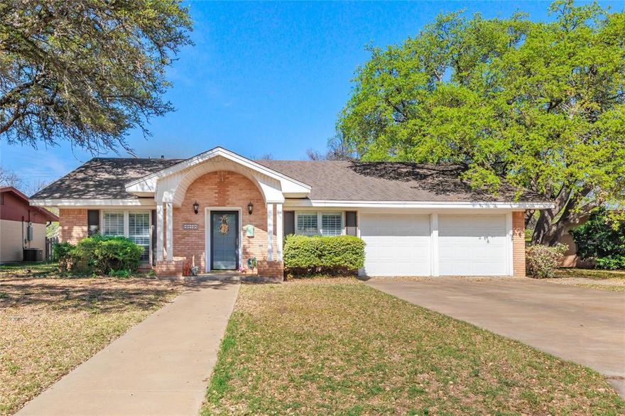 Beautiful family home, with great curb appeal and ready-to-enjoy- spaces inside and out! BRAND NEW ROOF! Deluxe impact resistant 30 year roof, installed July 2023. This home offers 3 bedrooms, 2 baths, and large living areas with a grand vaulted ceiling in the spacious kitchen. A cozy rock fireplace takes center stage in the living room welcoming all, the kitchen offers plentiful cabinets, oversized island, natural lighting with skylights, and all will love the perfect office space beside it.  Split bedroom arrangement, and the master truly beholds a wonderful space, with a wooden bonus room for plants or gym. This home has an oversized bonus room for man cave, hobbies, or another bedroom if needed. Backyard is privacy fenced, shop with garage entrance to alley, and this home backs up to pasture. Do not miss this one!