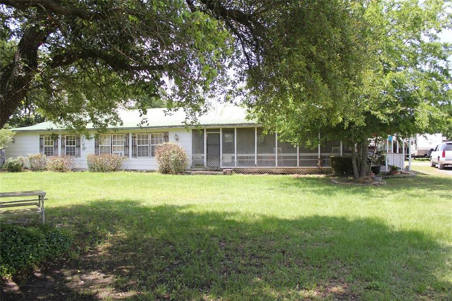 Attn: Horse trainers-Animal Breeders-Pig and Goat Farmers, Llama or Emu breeders? Iron fences and chutes, sectioned areas for culling animals, covered stall barn with tack room and office. House is customized dbl wide multi living spaces & porches. Home could serve a large family or multiple families. Split bedrooms with 4 baths and a bonus office. Huge master closet in spacious master with a bonus room that could be a music, wrapping, or exercise room. Englander WBF will keep you warm during the colder nights. Carport leads to mudroom. MIL suite is wheelchair accessible, includes a spacious bedroom & bath plus a living space that leads to a screened in porch. Barn is ready for animals!