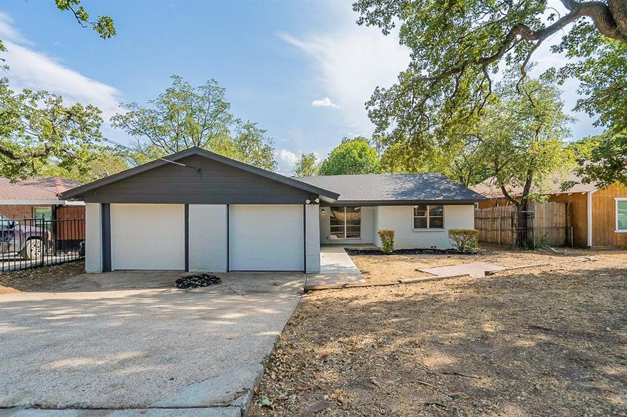 4 bedroom 3 bathroom stunner in Fort-Worth!  Returning to the market after renovation work! You’ll enjoy preparing meals in the gorgeous kitchen with sleek counters, stainless appliances, and beautiful spacious cabinetry. Entertaining is a breeze with this great floor plan complete with a cozy fireplace. The primary bedroom features a spacious closet, and a private bathroom. Lush green landscape surrounds this beautiful house. This home has been virtually staged to illustrate its potential.