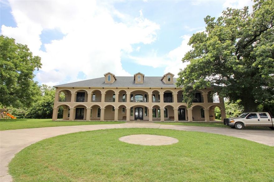 Secluded at the end of a quite country road.  Spectacular custom built 7 bedroom luxury residence on 108 lush private acres. Designed as a bed and breakfast, this property would be incredible as a corporate retreat.  Natural stone counter tops and stainless steal appliances adorn the well appointed kitchen. Romantic primary bedroom features a gorgeous fireplace, and lavish bath downstairs. Dining room, airy open breakfast area and oversized game room are perfect for entertaining.  Six additional bedrooms, each with their own full private bath, walk in closet, and balcony access, a comfortable living area, half bath and theater complete the upstairs area.  The grounds feature corrals for livestock.  The barn, stalls, and pens help to make managing the furry friends convenient.  Views of the deer and other wildlife from the balcony overlooking the stocked bass pond and pasture land. Buyer and buyer agent is responsible for confirming all information.