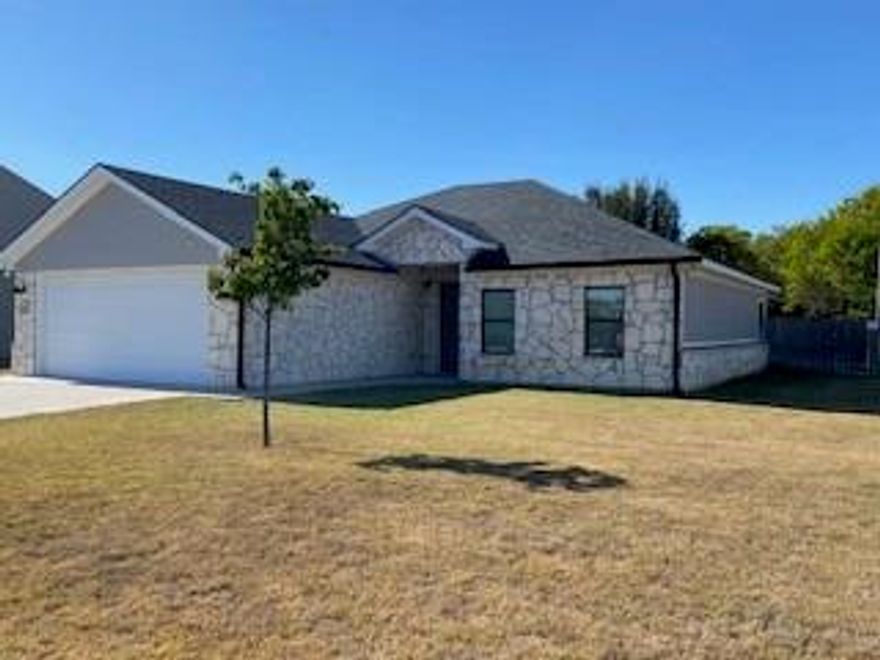 Beautiful Home in a Quiet, Desirable Neighborhood! Welcome to this stunning home located on a peaceful, clean street surrounded by new and newer homes, just minutes from the local school. You'll love the open concept floor plan with split bedrooms, perfect for both privacy and family living. The kitchen is a true highlight, featuring bright white cabinetry, granite countertops, a stylish tile backsplash, stainless steel appliances, and a bar with a double sink, ideal for casual meals or entertaining guests. The spacious master suite offers a coffered ceiling, a large walk-in closet, and a private bath with duel sinks and a walk-in shower. Two additional bedrooms share a well-appointed full bathroom between them. Step outside to enjoy the large covered back porch, accessible from both the living room and the master bedroom-perfect for morning coffee or evening relaxation. The backyard is fully enclosed with a wood privacy fence and includes an above-ground pool, which can stay or be removed at your preference. Sitting on a corner lot, this home combines modern style, comfort, and convenience in a fantastic neighborhood you'll be proud to call home.