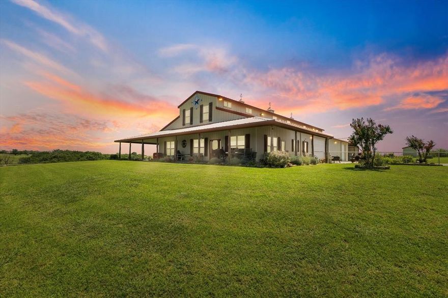 Welcome to your own slice of Texas paradise! This stunning 85-acre property is fully fenced and cross-fenced, ideal for livestock and agricultural use, with a stock tank for added function and beauty. Perched on gentle elevation, the property offers panoramic views that showcase the natural beauty of Parker County—rolling pastures, big Texas skies, and peaceful sunrises and sunsets that never get old.  The main residence is a beautifully maintained 3-bedroom, 2.5-bath barndominium featuring a spacious bonus family room, an oversized garage with ample storage, and the peace of mind of a whole-home generator. The home is on a private well, offering self-sufficiency and lower utility costs.  For those needing space to work or play, enjoy the impressive climate-controlled 30x80 shop, perfect for hobbies, business, or equipment storage. There’s also a 40x40 barn with extended awnings on two sides, plus covered RV parking with full hookups.  As a bonus, the property includes a second home—a 3-bedroom, 2-bath guest house, also on its own private well—perfect for multi-generational living, guests, or rental income.  Whether you’re seeking a family homestead, an income-producing property, or a private retreat with room to roam, this ranch offers unmatched versatility, breathtaking views, and the peaceful lifestyle you’ve been dreaming of.