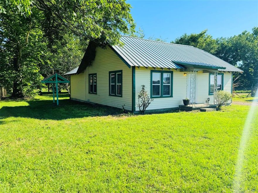 Nicely remolded cottage-style home in the heart of Historical Winnsboro, TX, about 90 miles east of Dallas. All new doors, flooring, counter tops & cabinets throughout the home. This cozy 2BR-1BA features a fresh airy living room, kitchen with pantry, & electric oven-range. The kitchen is open to the dining area & a full size utility room with shelving. Large primary bedroom with good closet space & door to the back yard. Guest BR is also spacious. There's an exit to the back yard from the utility room as well. Walking distance to downtown with shops, restaurants, Arts Center, Farmers Market & MORE!