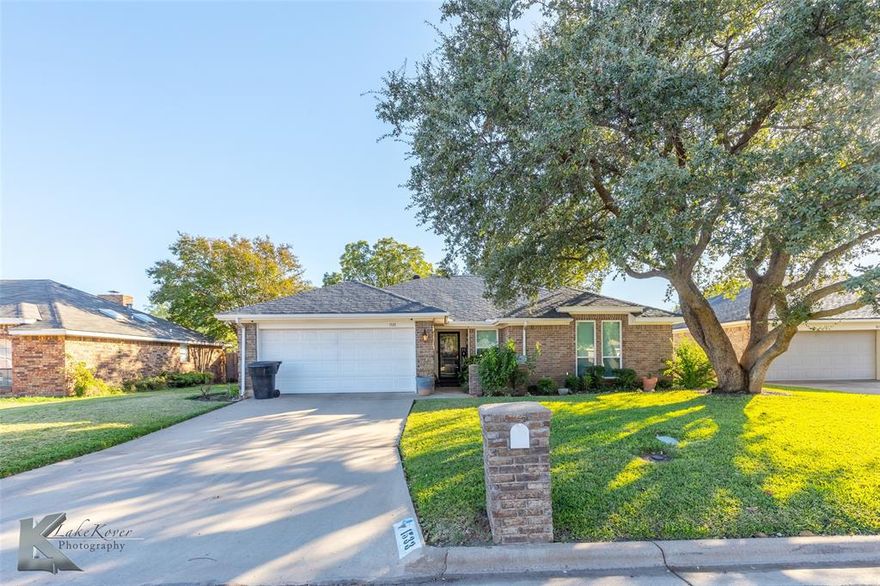 This perfectly charming traditional home offers 3 bedrooms, 2 bathrooms, and a welcoming personality all its own. From the moment you arrive, the curb appeal draws you in—beautifully maintained and full of character. Inside, you’ll find a cozy living room with a fireplace, fun and thoughtful lighting throughout, and a home that simply feels loved. The primary bathroom features heated floors for a touch of everyday luxury, while classic details and warm finishes add to the inviting atmosphere. Every corner of this home reflects care, comfort, and timeless charm.
 Buyer and Buyers agent to verify materials, schools, and square footage.