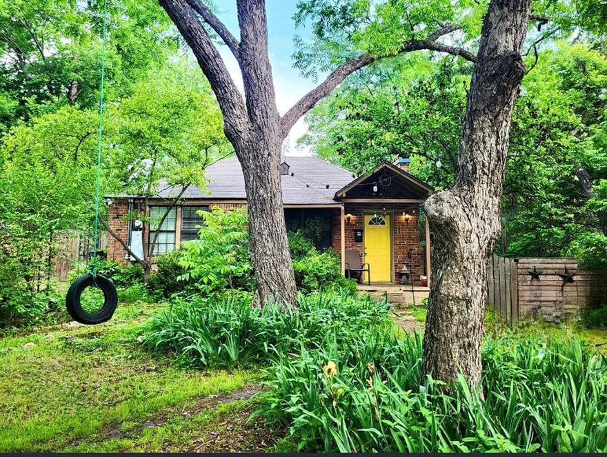 This cozy, bright, 3 bed 2 bath cottage-style home is nestled in the highly desirable Little Forest Hills neighborhood of Old East Dallas. Conveniently located, 1mi. from White Rock Lake and the Dallas Arboretum, 4mi. from Lower Greenville, 5mi. from Downtown and Deep Ellum, 7mi. from Oak Lawn and Uptown, 3mi. from Lakewood, 4mi. from SMU, and is within walking and biking distance to dining and shopping in Casa Linda area. Inside, the home is filled with natural light and surrounded by beautiful old-growth pecan trees. It features recently refinished hardwood floors, fresh interior paint, ceiling fans, adorable built-in bookshelves, charming archways, and marble countertops. The updated kitchen includes new white cabinetry, modern fixtures,new agate-styled porcelain tile, newer retro-styled appliances and a brand new skylight. There is also a brand new bathroom addition and  newer central AC and heat to further enhance comfort and efficiency. Additional amenities include a doggie door and parking for up to 4 vehicles. The open floor plan maximizes functionality while maintaining charm and character. The expansive yard offers both a spacious front and back yard, shaded by mature pecan trees, perfect for outdoor enthusiasts and nature lovers. The fenced backyard includes a deck, a bamboo-enclosed outdoor hot cold shower, multiple garden beds with rich soil, and a fire pit. Little Forest Hills is renowned for its lush tree canopy, ideal location, artistic community and welcoming atmosphere.  A large park at the end of the street offers basketball and tennis courts, a baseball diamond, playground, and walking trails a wonderful extension of this charming neighborhood's outdoor amenities. Yard maintenance monthly fee. Pets considered on an individual basis, fees apply. Renters insurance required. 6 mo lease considered.