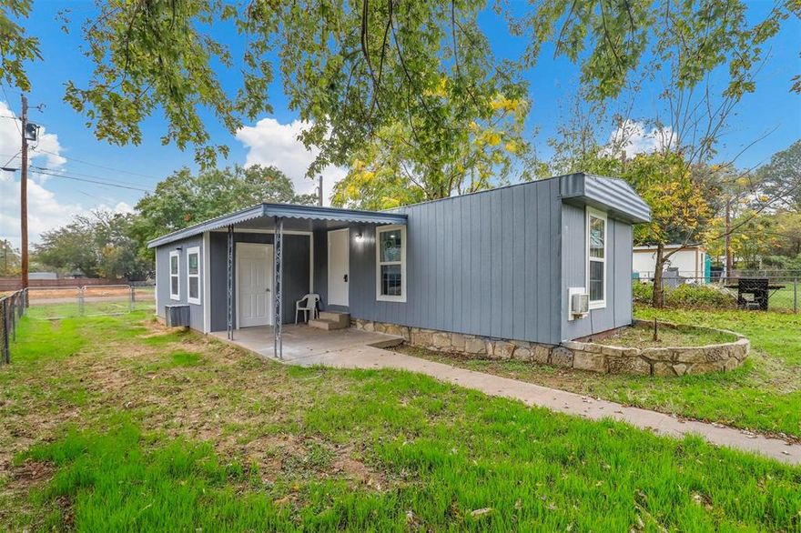 This affordable three bedroom, one and one half bath home was completely remodeled in 2025. You can walk just a few blocks to the Brazos river which feeds into Lake Granbury. This would be a perfect weekend retreat for families who love to spend time on the water. A large shaded front porch greets you as you enter. New items include air conditioner, water heater, sink and cabinets. New heavy duty vinyl plank flooring throughout will be very durable. The kitchen and bathrooms have new appliances and fixtures, with new windows, new window units and fresh paint. Added bedroom has its own entrance. You also have a newly installed She Shed with additional space for storage.  Owner financing available. 15 year term with 10% interest and 20% down, 1% loan fee.