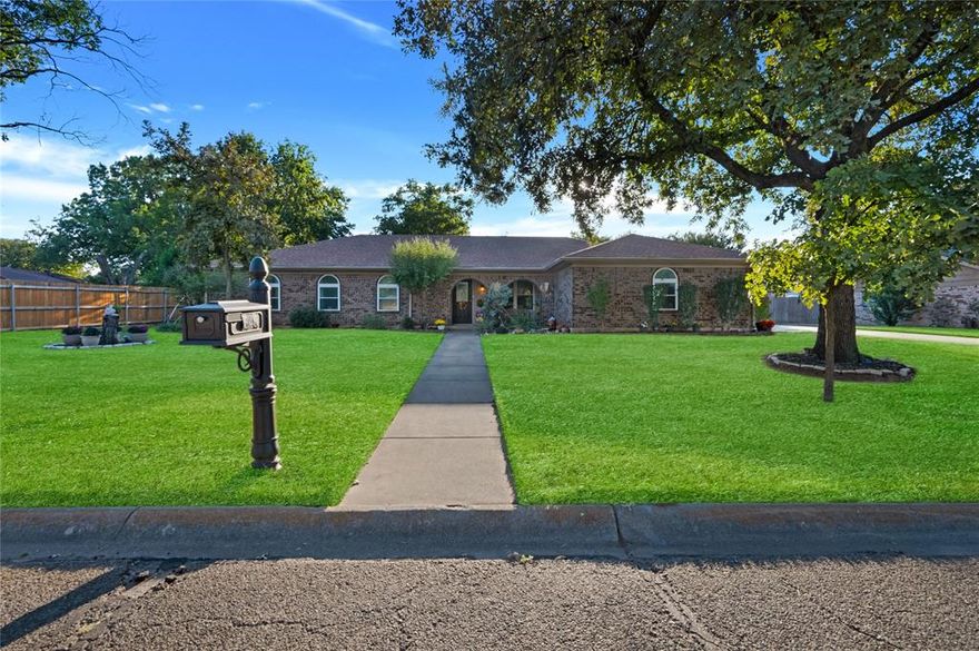 Schedule your showing and be HOME FOR CHRISTMAS!  This beautifully maintained home offers exceptional curb appeal with a welcoming front porch and a large, gated side driveway. Inside, you’ll find a bright and open layout featuring 4 spacious bedrooms and 2 full bathrooms. The living area includes a cozy gas fireplace and flows seamlessly into the kitchen and breakfast nook, creating an ideal space for family gatherings and entertaining.  The home features newer windows and flooring, no popcorn ceilings, and plenty of natural light throughout. The dining room—currently used as an office—provides flexible living options to suit your needs. Three of the four bedrooms include walk-in closets, and the oversized laundry room provides additional convenience and storage space.  Step outside to enjoy the expansive backyard, perfect for outdoor entertaining, recreation, or future additions. With ample parking, a large lot, and thoughtful updates, this property offers both comfort and functionality.  This home is perfect for anyone looking for space to grow in a welcoming, move-in-ready property. New roof will be installed in December a big plus to lowering insurance cost!