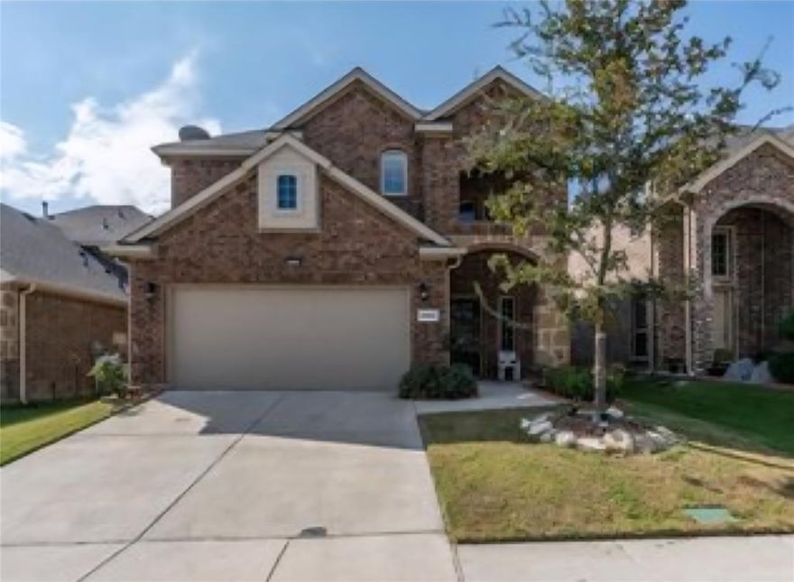 Come see this inviting Two-Story layout. Warm brick and stone exterior with a covered entry, two-car attached garage, and manicured lawn. Bright, open main floor grand foyer opens to a formal dining area and living room featuring an electric fireplace and hardwood floors. A cozy family room flows into the kitchen and breakfast nook for seamless entertaining. Chef’s Kitchen equipped with granite counters, stainless steel appliances, pantry, and warm-toned cabinetry. Luxurious primary suite spacious first-floor retreat with dual vanities, garden tub, separate shower, and walk-in closet. Spacious upstairs layout three generous bedrooms plus a full bath. The loft flex space is perfect for a home office, playroom, or media area. Outdoor living nice sized backyard with a covered patio—ideal for grilling, lounging, or gardening.