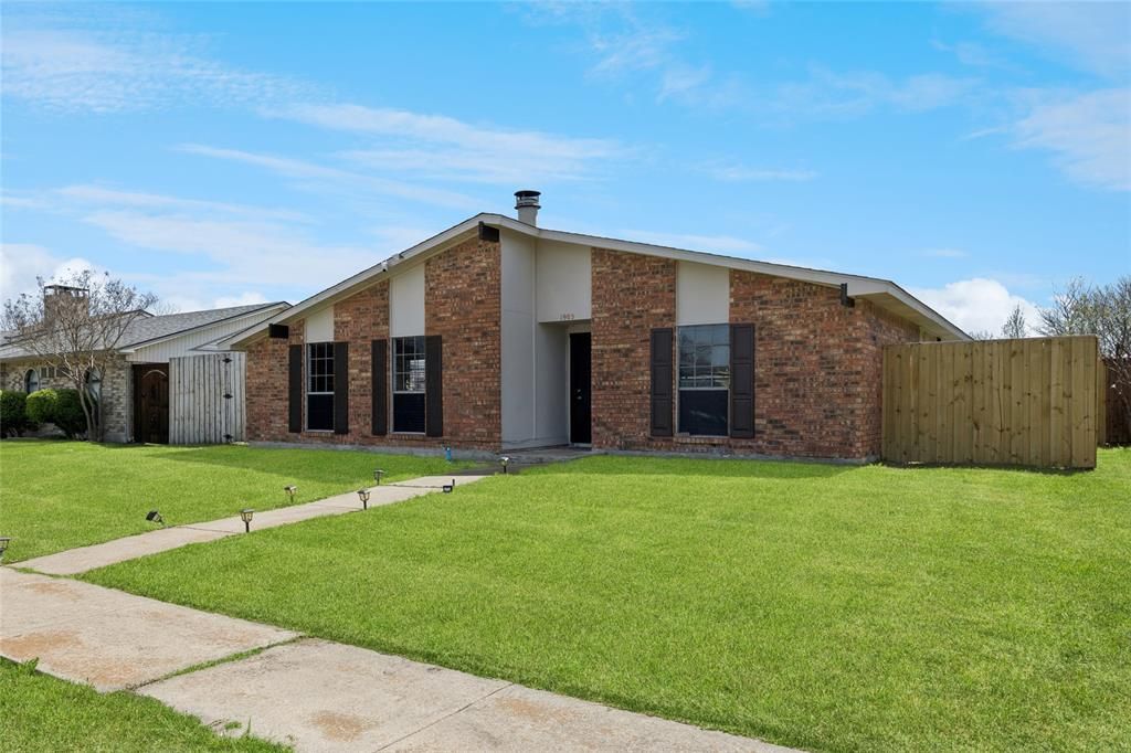 Photo of 1905 Montana Trail, Grand Prairie, TX 75052 (MLS # 21215205)