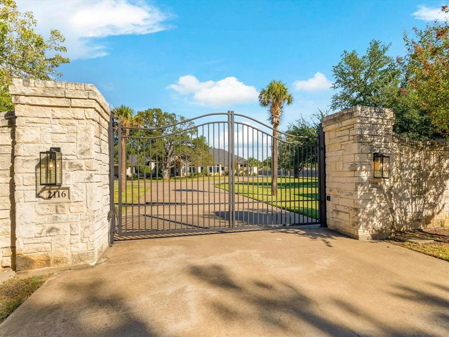 INCREDIBLY PRIVATE gated luxury Texas estate home on 3 ac in the center of the DFW Metroplex. Private drive extends to impressive single story Austin stone exterior built to accommodate the natural trees while still maximizing parking. Pond with water feature, koi, turtles & other wildlife through the seasons. Enter into beautiful open & light living-dining spaces that have definition but work together. Centers around a backyard entertainment hardscape of 1,800+ sf to enjoy the nature surrounding from all areas. Four bedrooms are each separate wings allowing for ease of multigenerational living. All AV equipment conveys including Control4 (TVs, SS & lighting) & Lume ext surveillance. High speed internet plus Generac whole house generator tied into the natural gas lines to cut on & off based on power needs. And don’t miss the 7,442 sf outbuilding. Currently used as a sport court for baseball, basketball, ping pong & gym but could be used as RV-boat-car parking or modified to your needs.